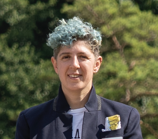 Image showing Dr Dominque Bouchard with a background of green foliage